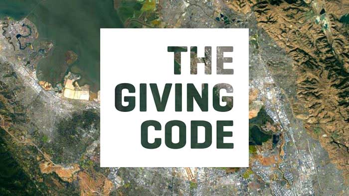 aerial view of land with the words The Giving Code knocked out in a white box